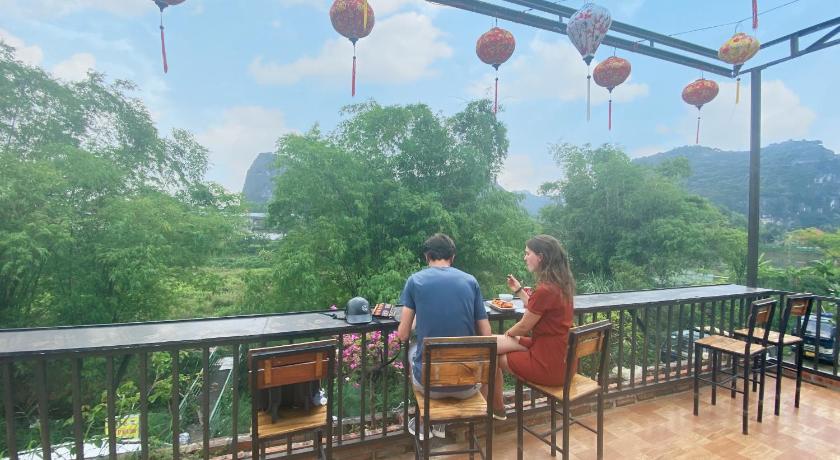 people sitting at tables in a restaurant, Trang an moon garden homestay in Ninh Bình