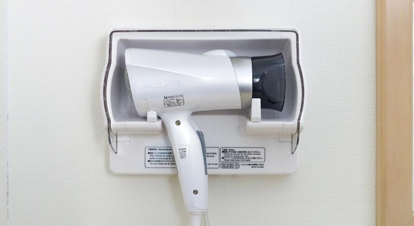 a blow dryer that is attached to a wall, Toyoko Inn Ise Matsusaka Ekimae in Tsu