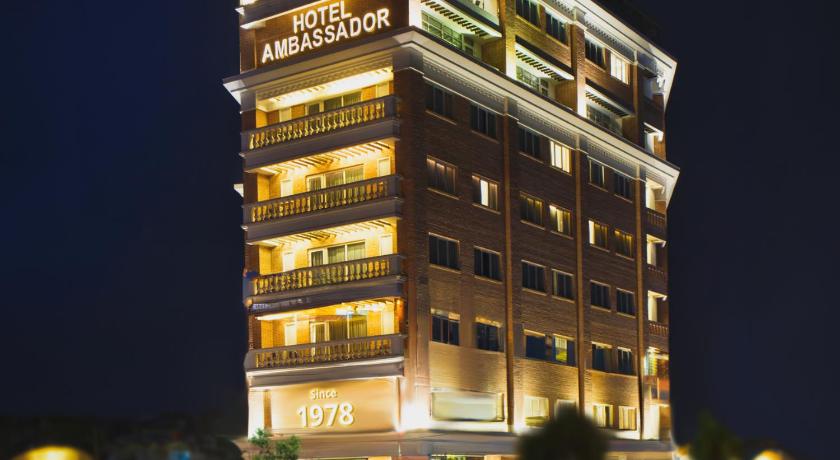 a large building with a clock on the side of it, Hotel Ambassador by ACE Hotels in Kathmandu