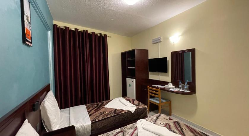 Deluxe kétszemélyes ággyal vagy 2 külön ággyal (Deluxe Double or Twin) fotója 1