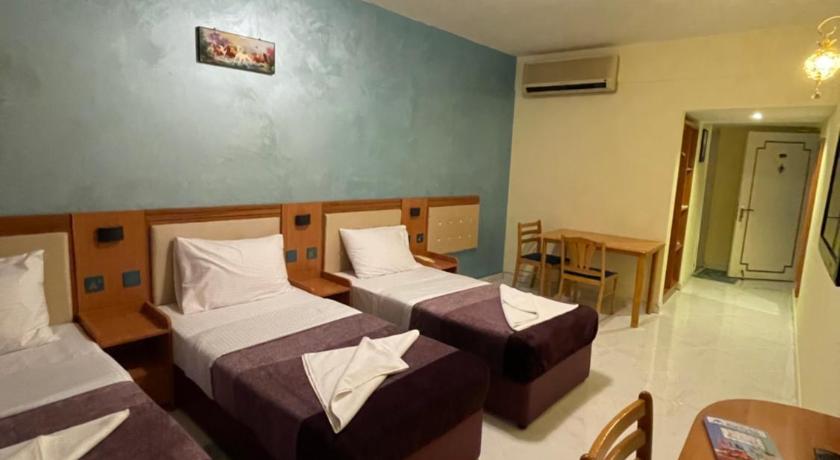 Háromszemélyes deluxe szoba (Deluxe Triple Room) fotója 1