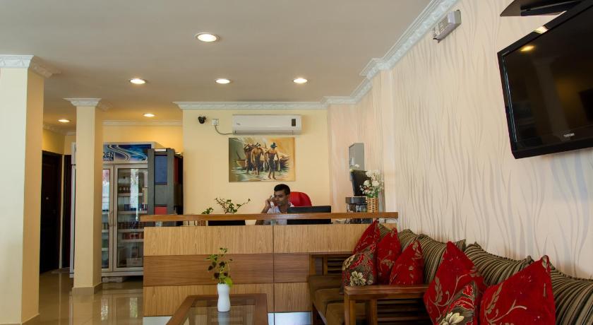 a living room filled with furniture and a tv, Beach Palace in Male City and Airport