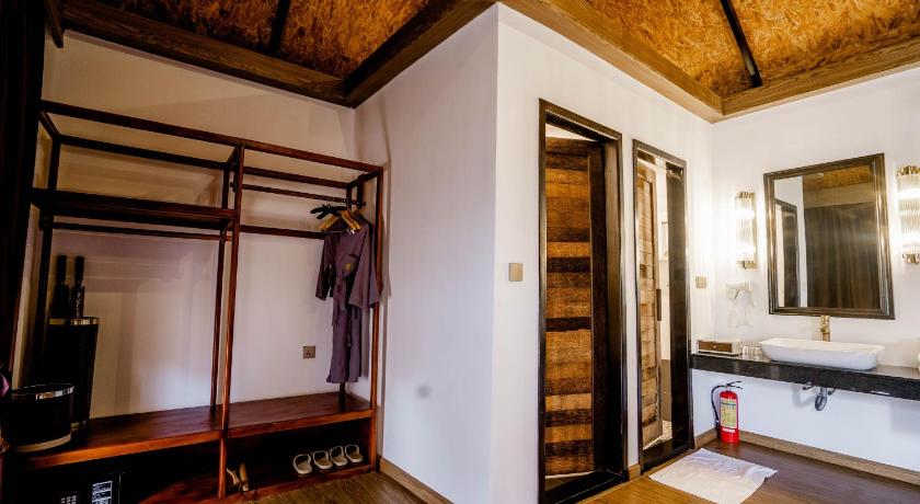 a room with a wooden floor and a large window, Good Time Relax Resort in Kampot