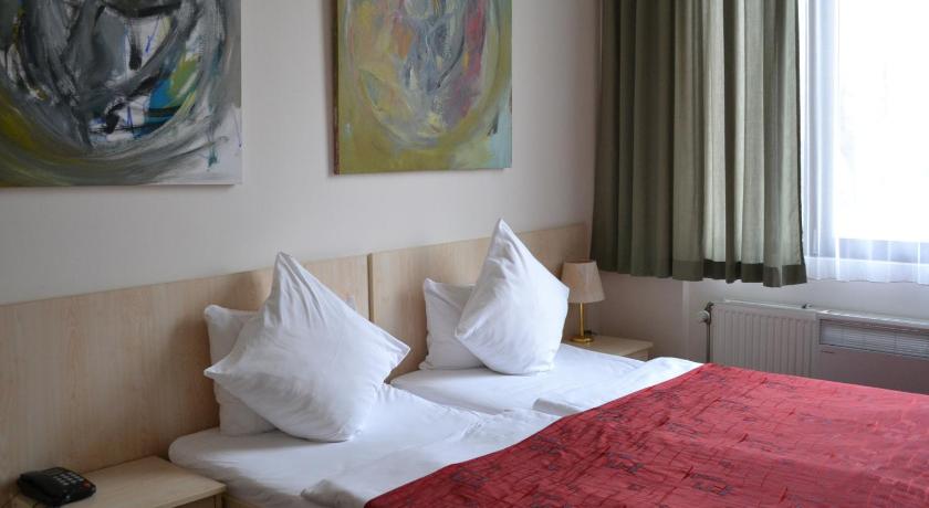 Image of Triple Room with Private Bathroom 0
