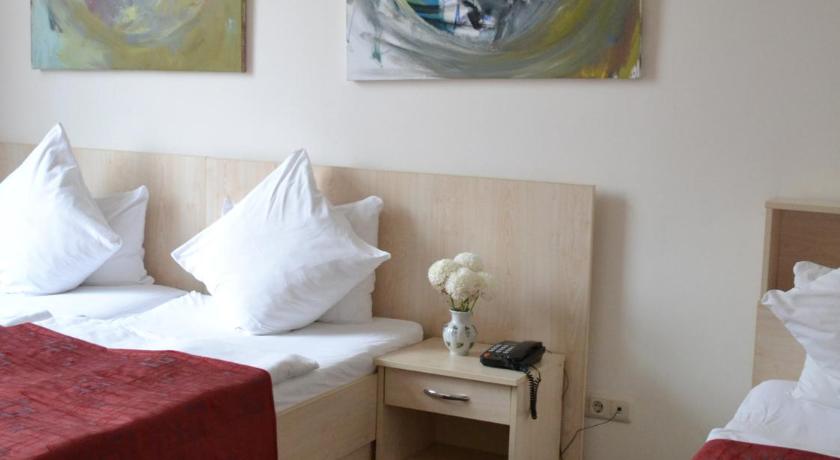 Image of Triple Room with Private Bathroom 1