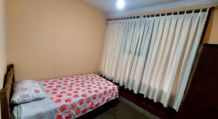 Imagem de Quarto Individual com vista para o jardim (Single Room with Garden View) 1