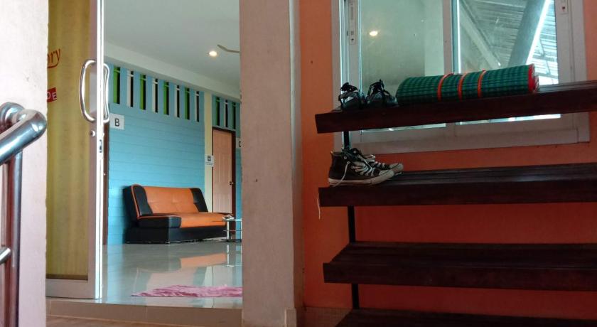 a room with a stairway leading to a stairwell, Lanta Just Come Hotel (SHA Plus+) in Koh Lanta