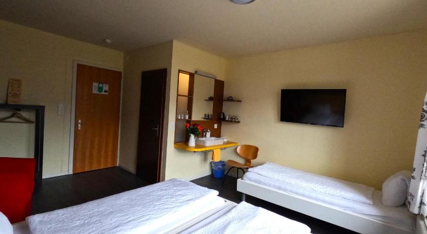 Image of Triple Room with Bathroom 4