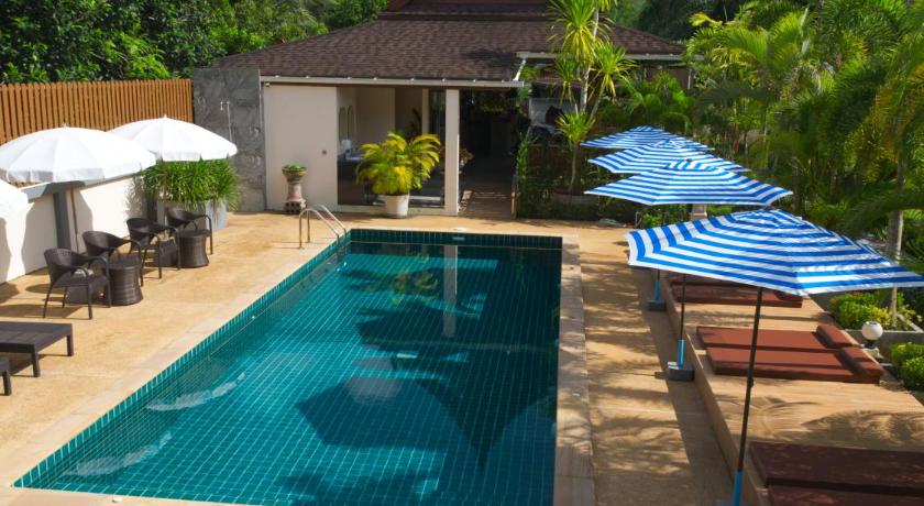 a patio area with a pool table and chairs, Chanapha Residence (SHA Extra Plus) in Krabi