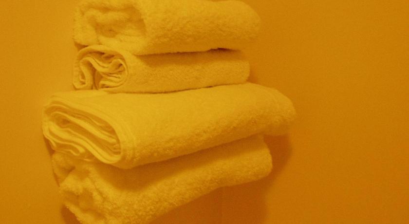 a white towel hanging on a white wall, Hanover Hotel in Liverpool