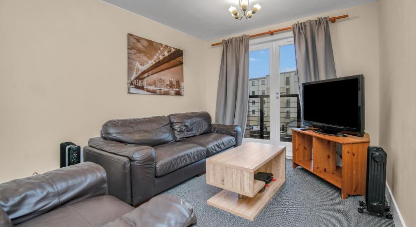 a living room filled with furniture and a tv, Coady Apartment (Sleeps 5 ) EDINBURGH CITY CENTRE  in Edinburgh