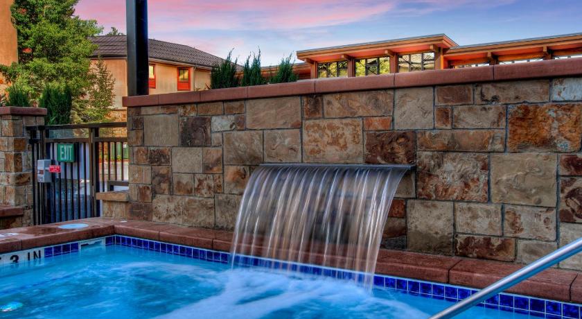 a pool of water with a fountain in front of it, Village at Breckenridge Wetterhorn 3204 Condo in Breckenridge (CO)