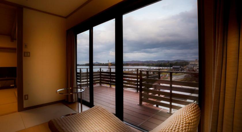 a view from a balcony of a hotel room, Hotel Kitanoya in Miyazu
