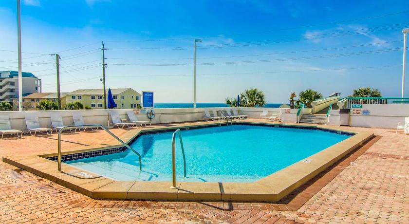 a pool with a pool table and chairs, Surfside Resort 3-1208 in Destin (FL)