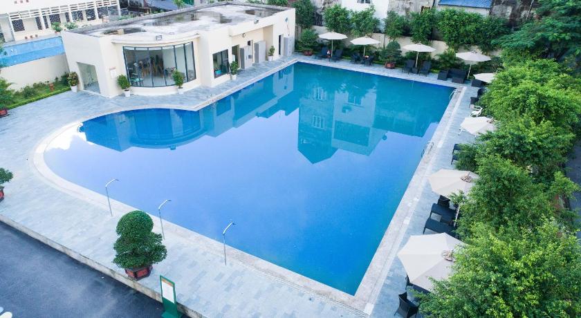 a large swimming pool in a residential area, Muong Thanh Luxury Bac Ninh Hotel in Bac Ninh