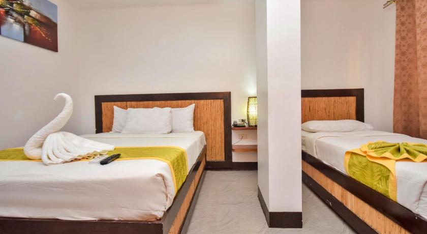 Standard háromszemélyes szoba (1 kétszemélyes ággyal és 1 egyszemélyes ággyal) (Standard Triple (1 Double Bed And 1 Single Bed)) fotója 11
