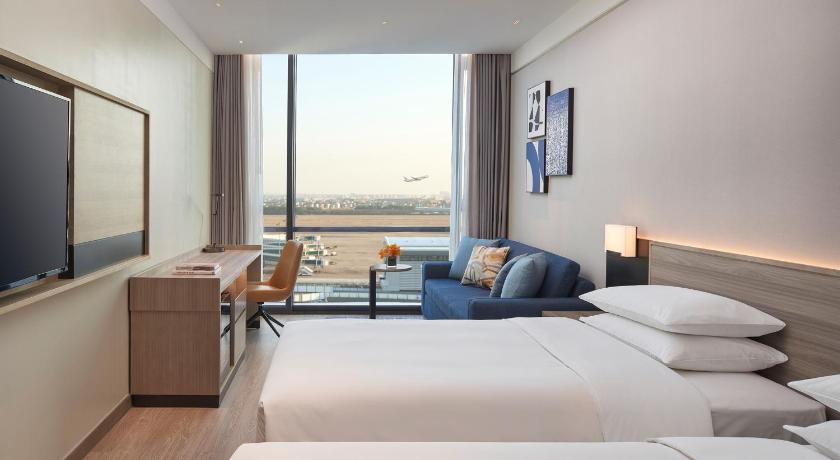 Image of Airport View Two Twin Beds (With Sofa Bed) 0