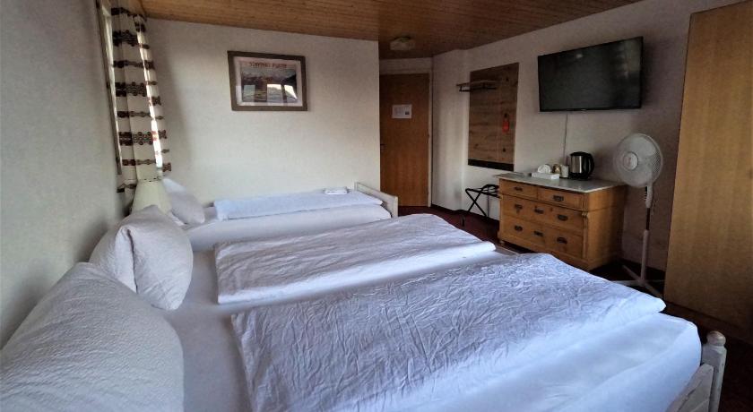 Image of Triple Room with Bathroom 10
