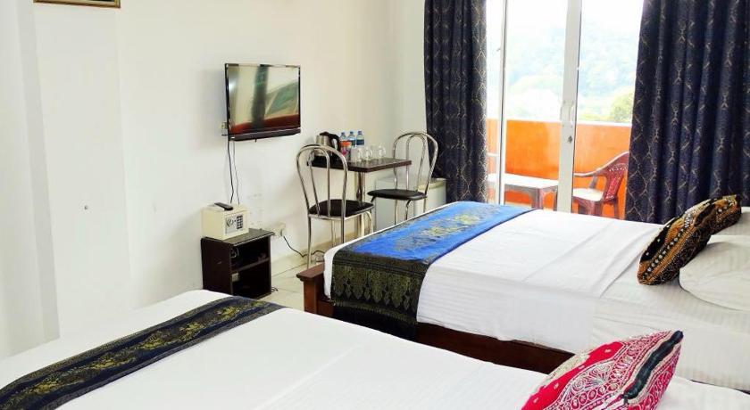 Image of Deluxe Triple Room 0