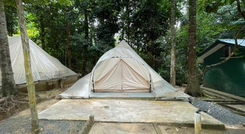 a tent on the ground with a tent on top of it, Danz Eco Resort in Kuala Tahan