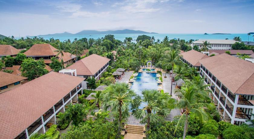 a large building with palm trees in front of it, Bandara Resort and Spa, Samui in Koh Samui