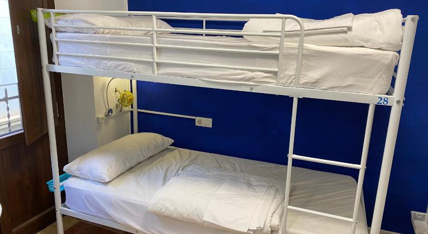 Image of Bed in 4-Bed Mixed Dormitory Room with Private Bathroom 4