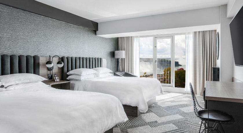 Image of American Fallsview, Guest room, 1 Queen, Sofa bed, Partial Falls view 0
