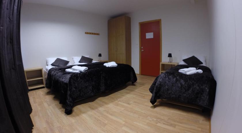Image of Basic Triple Room with Shared Bathroom 1