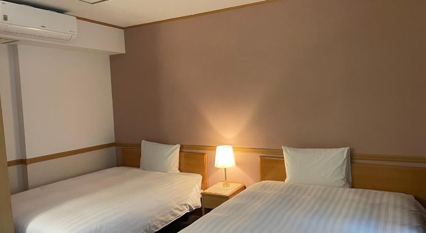 Imatge de Habitació Doble Deluxe - 2 Llits per a No Fumadors (Deluxe Twin Room - Non-Smoking) 0