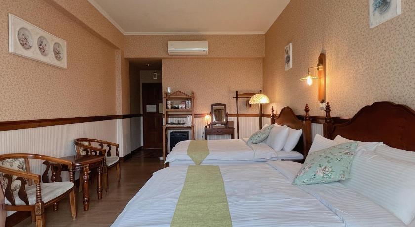 Image of Quadruple Room with Garden View 1