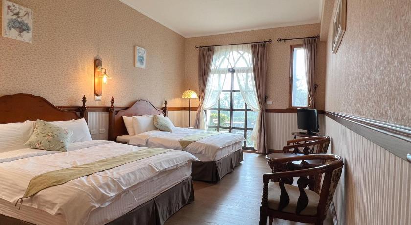 Image of Quadruple Room with Garden View 0