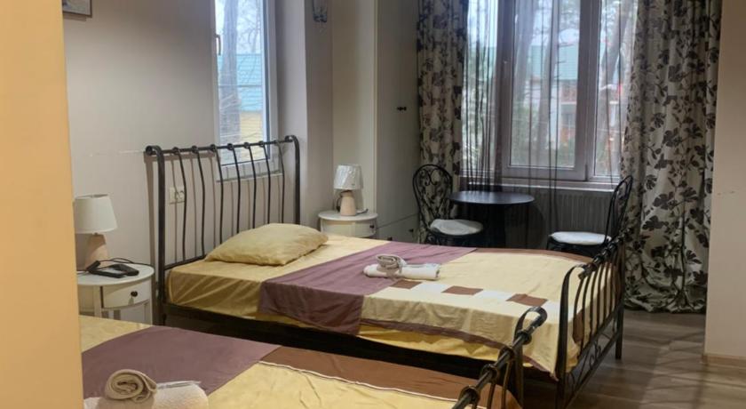 Szoba 2 külön ággyal és kilátással a hegyre (Twin Room with Mountain View) fotója 0
