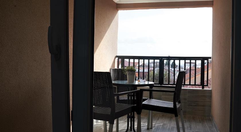 Aster Apartments photo