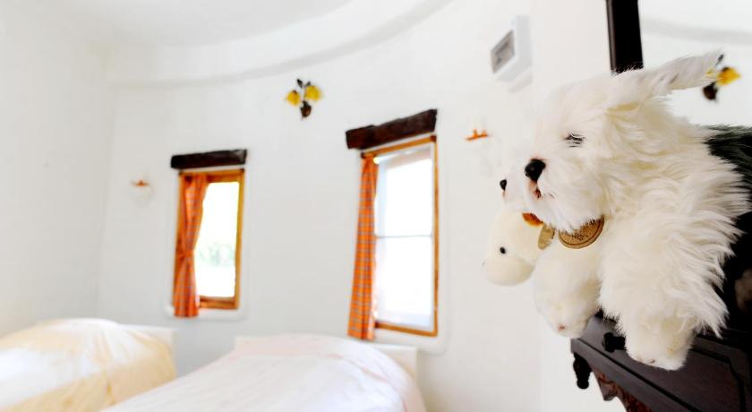 รูปของวิลลาดีลักซ์สองห้องนอนพร้อมวิวสระว่ายน้ำ (Deluxe Two-Bedroom Villa with Pool View) 0