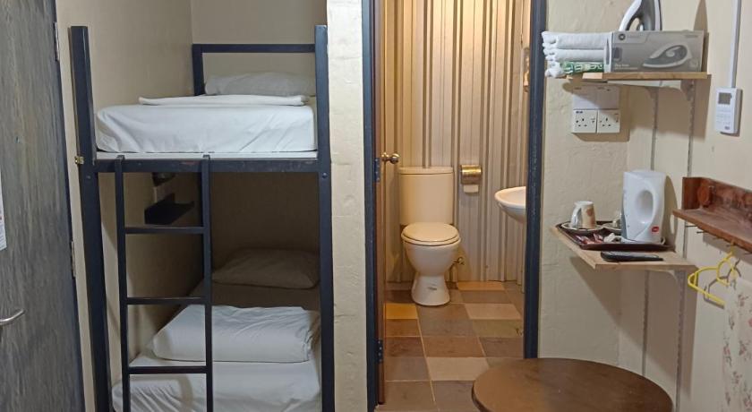 Quadruple Room with Bathroom, Myera Hotel in Banting