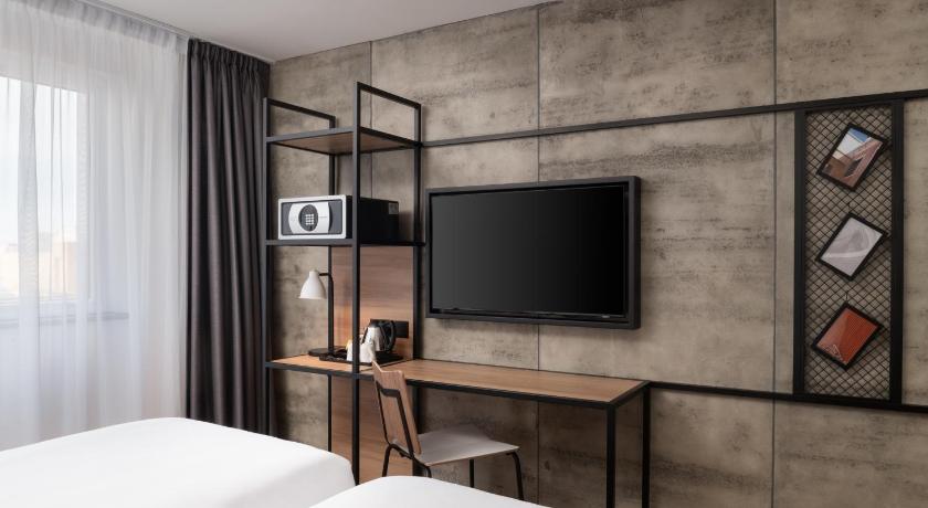 Image of Superior Triple Room with Two Single Beds and One Sofa 5