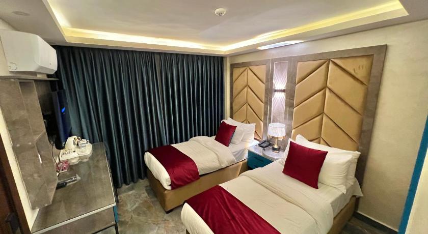 Imagem de Quarto triplo Deluxe (Deluxe Triple Room) 5