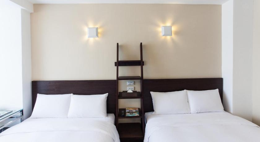 Image of Deluxe Double Room with Two Double Beds 7