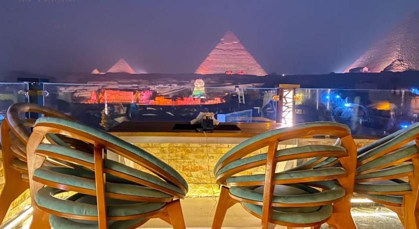Cleopatra pyramids view photo
