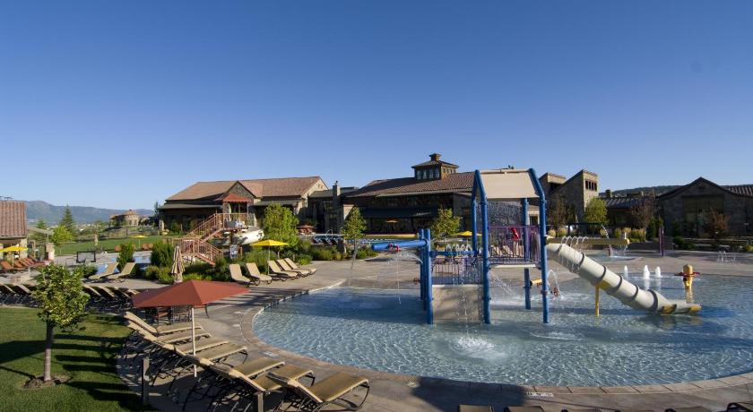 a swimming pool with a pool table and chairs, The Lodge at Flying Horse in Colorado Springs (CO)