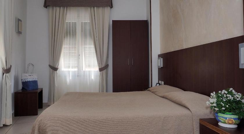 Фото: Четырехместный номер «Комфорт» (Comfort Quadruple Room) 1
