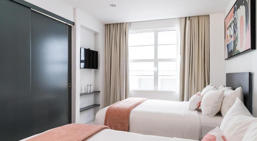 Immagine di Camera con 2 Letti Matrimoniali (Double Room with Two Double Beds) 8