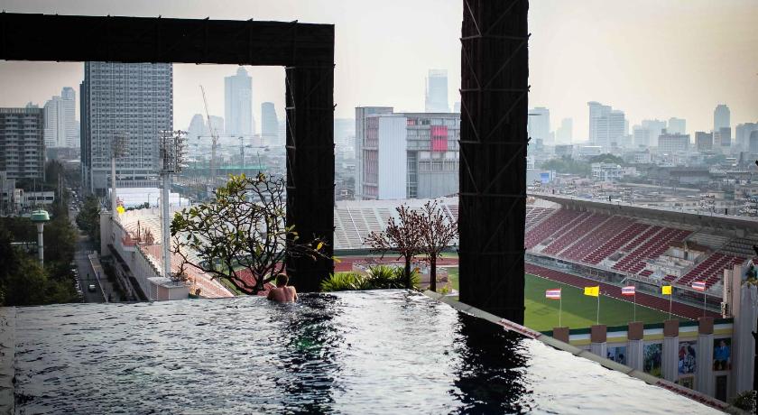 a bridge over a body of water, Siam @ Siam Design Hotel Bangkok (SHA Extra Plus) in Bangkok