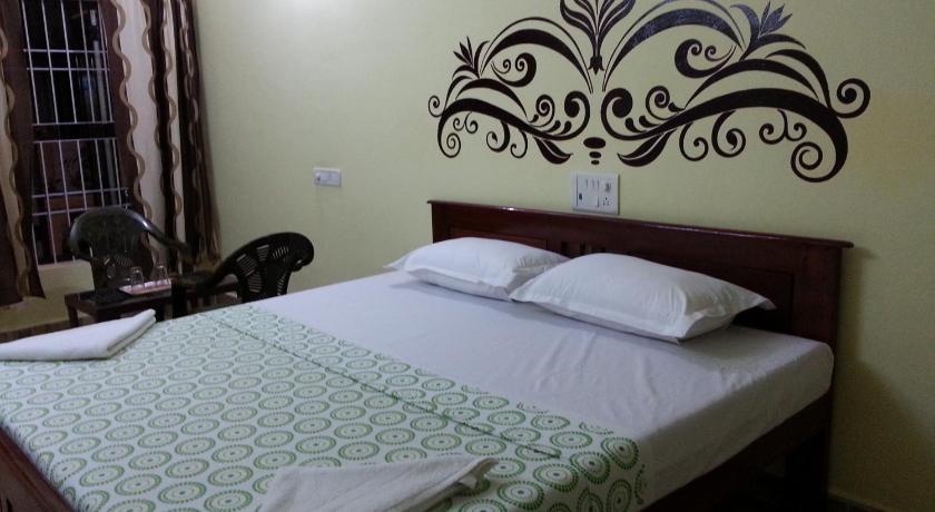 Image of Deluxe Double Room (2 Adults + 1 Child) 0