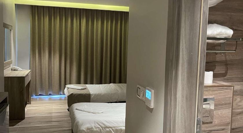 รูปของห้องดีลักซ์เตียงใหญ่หรือเตียงแฝด (Deluxe Double or Twin Room) 1