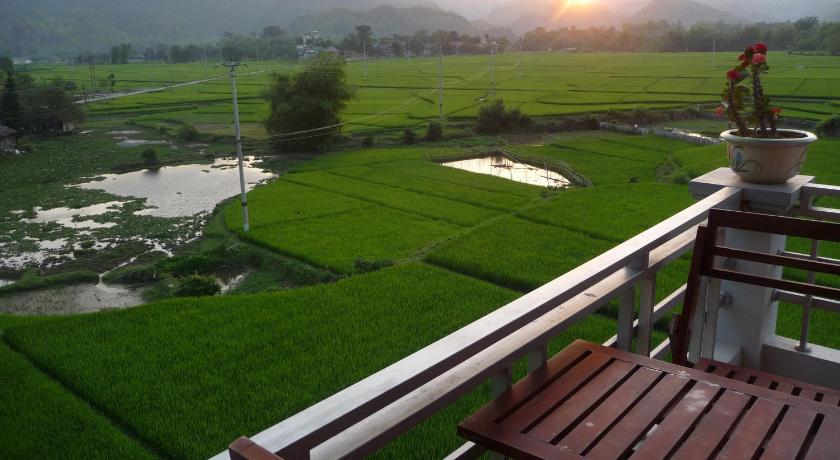 a view from a balcony overlooking a lake, Mai Chau Valley View Hotel in Mai Chau (Hoa Binh)