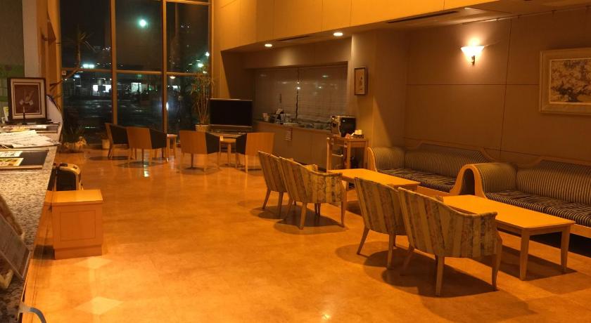 a room filled with tables and chairs, Suzuka Storia Hotel in Suzuka