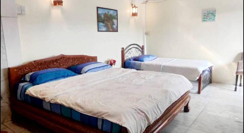 Image of Triple Room with Private Bathroom 3