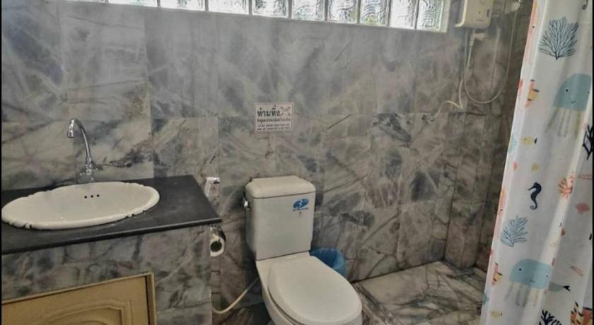 Image of Triple Room with Private Bathroom 2