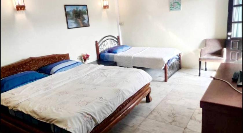 Image of Triple Room with Private Bathroom 0